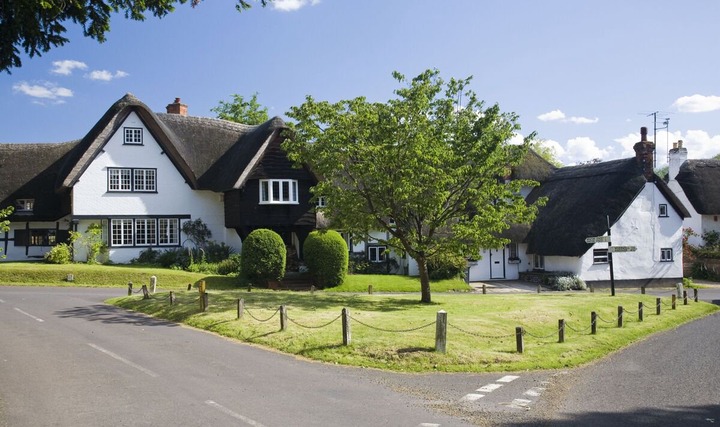 Beautiful UK village where every resident is forced to paint their door the same colour