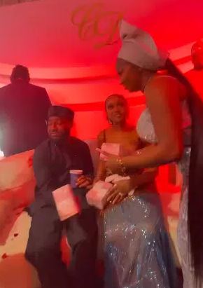 Mixed Reactions As Papaya Ex Gifts Bundles Of Money To Davido And Chioma On Wedding Day (Video)