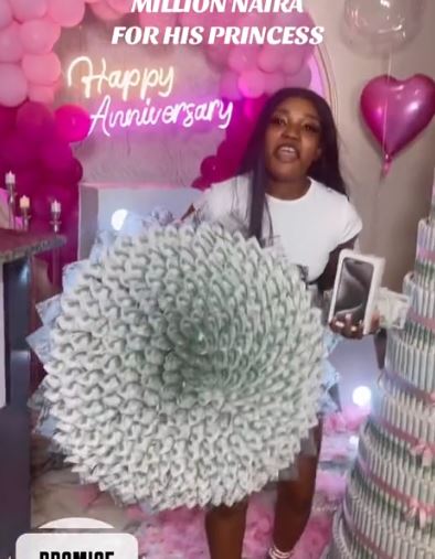 Nigerian Lady Receives Celebrates Brand New iPhone 15 Pro Max, ₦3 million Cheque From Boyfriend On Their First Anniversary (Video)