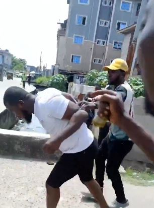 Nigerian Man Beaten With Bottles And Planks Before Being Thrown In Gutter For Allegedly Being G*y (Video)