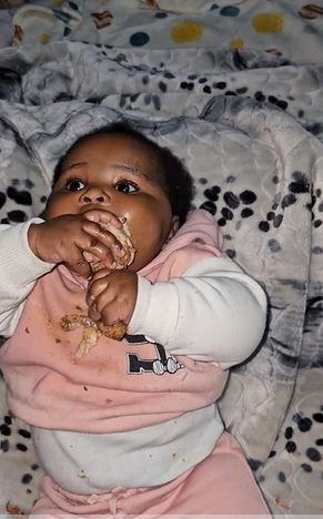 Video Of 8-month-old Baby Devouring Chicken Causes Stir Online