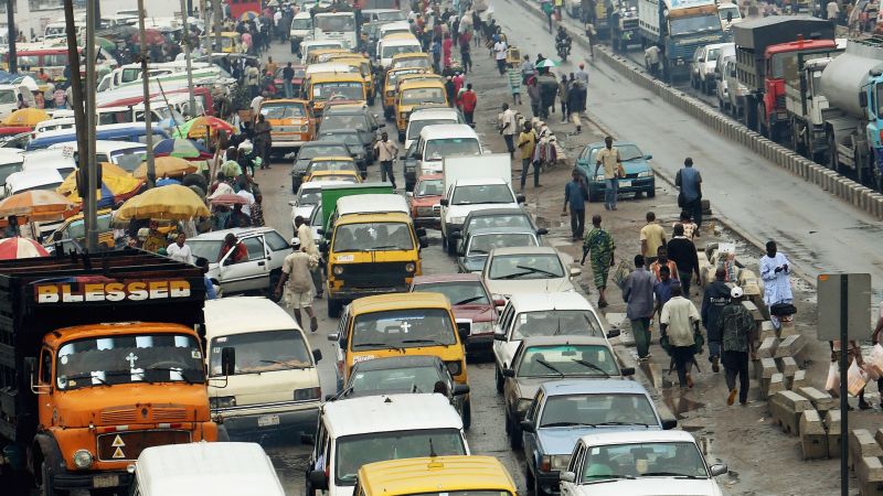 Nigerian Workers Groan As Downpour Causes Gridlock In Lagos