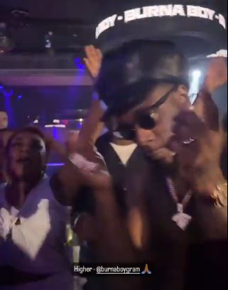 Burna Boy Storms The Club With His Parents On His Birthday (Video)