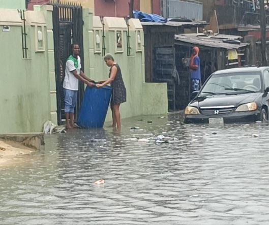 Lagos State Commissioner For Environment Vows To Take Action Against Two Persons Caught On Tape Allegedly Throwing Trash Into Flood Water