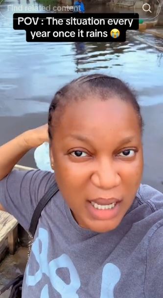 Lady Reveals That People Move Around In Canoes When It Rains In Her Neighbourhood In Lagos (Video)