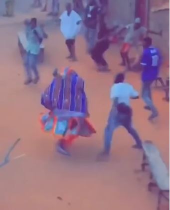 Moment Man Punched A Masquerade for Flogging Him (Video)