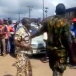 Nigerian Soldiers Caught On Camera Brutalizing Young Man In Public For Wearing Camouflage (Video)