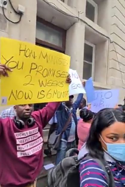 FG Intervenes After Nigerians Storm The Nigerian Embassy In London To Protest Long Delays In Passport Processing (Video)