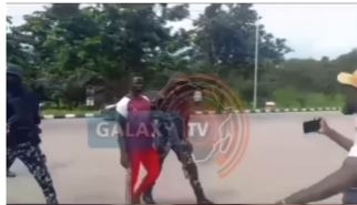 Police Arrest Man With Knife Trying to Attack Protesters in FCT, Abuja (Video)