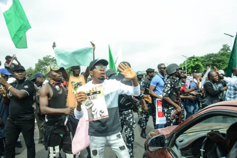 Mother With Baby Confronts Police After Teargas, Pepper Spray Used On Protesters