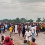 Protesters Overwhelm Security Operatives, Block Abuja-Kaduna Highway (Photos)