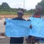 There Is Hunger – Man Laments As He Lends His Voice To #endbadgovernanceinnigeria Protest While Carrying A Placard That Is Anti-protest (Video)