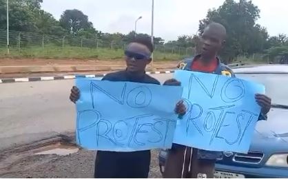 There Is Hunger – Man Laments As He Lends His Voice To #endbadgovernanceinnigeria Protest While Carrying A Placard That Is Anti-protest (Video)