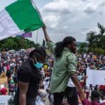 Nigeria Law Is Against You – Protesters Urge Police To Join Them (Video)