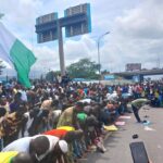 Muslim Protesters Pause Protest To Observe Friday Prayer In Lagos (Photos)