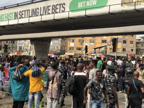 ‘We No Go Gree’ – Drama As Protesters Block Police Vehicles (Video)