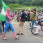 Man Storms Protest Ground With ”Spiderman” Outfit In Abuja (Photos)