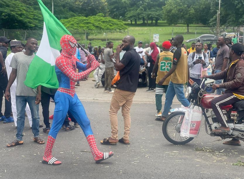 Man Storms Protest Ground With ”Spiderman” Outfit In Abuja (Photos)