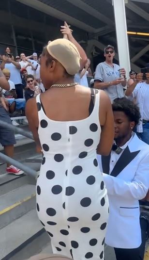 The Moment A Woman’s Wig Was Snatched From Her Head As Her Man Proposes To Her (Video)