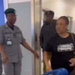 Drama As Nigerian Woman Tears Her Husband’s International Passport On Arrival At Airport (Video)