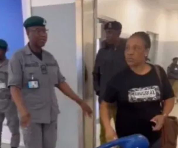 Drama As Nigerian Woman Tears Her Husband’s International Passport On Arrival At Airport (Video)