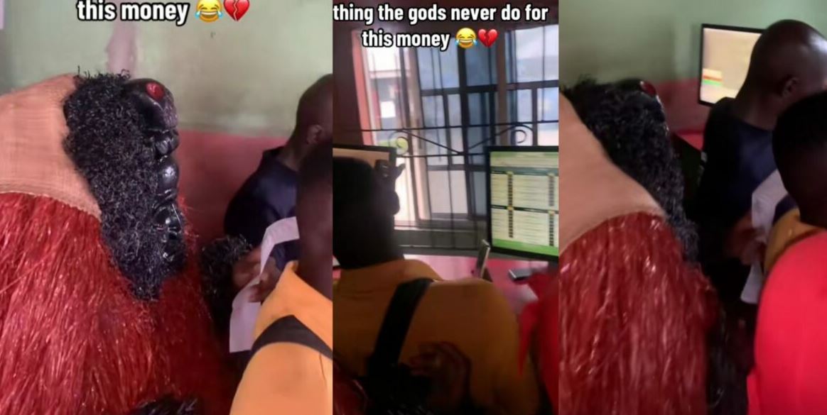 Mixed Reactions As Masquerade Is Spotted In Betting Shop (Video)